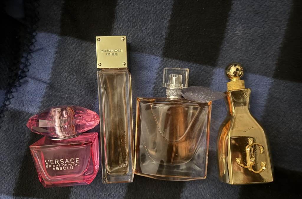 Luxury Versace perfume collection arranged in an elegant display