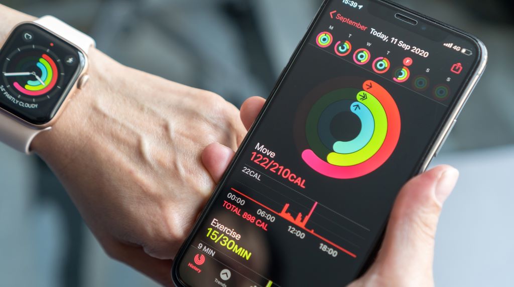 Smartwatch displaying heart rate and daily activity tracking for fitness goals