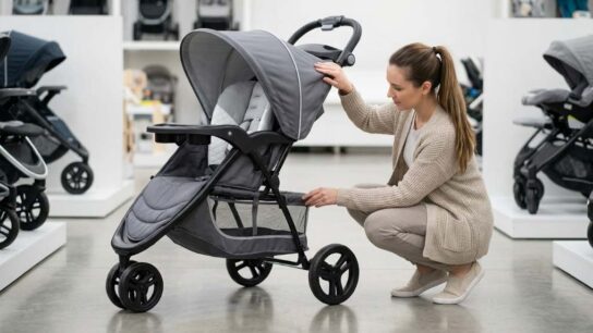 Baby Trend Expedition three-wheel jogging stroller with matching car seat docked on frame.